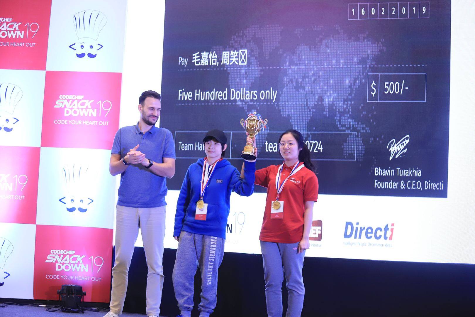 A picture of Sphere Engine staff members giving awards during a code challenge held in Bangalore, India